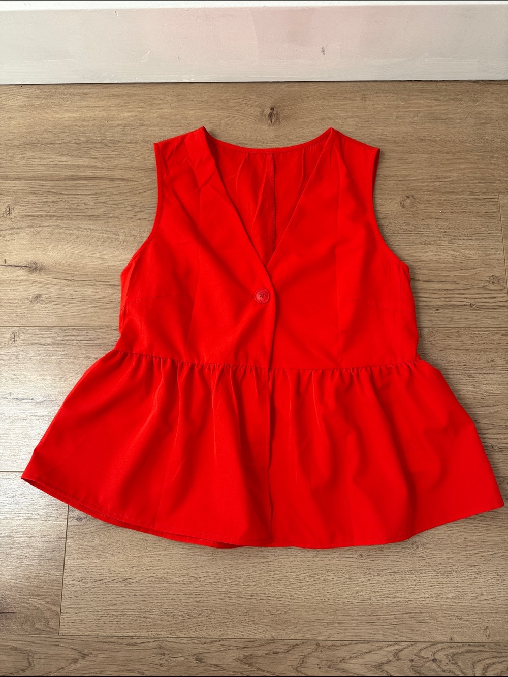 Red Sleeveless Peplum V-Neck Top